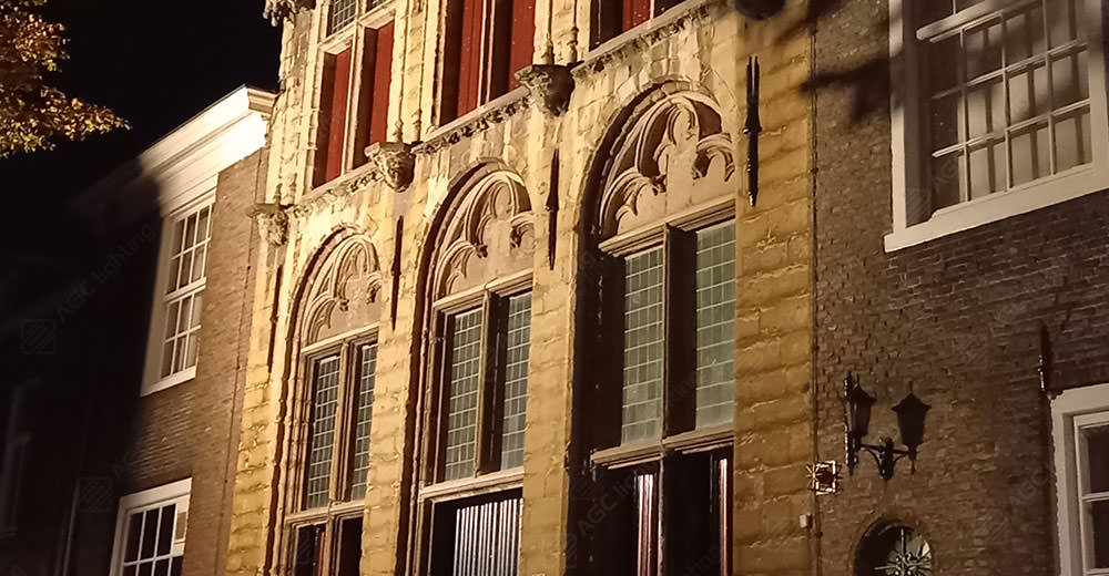 stone and brick building facade lighting