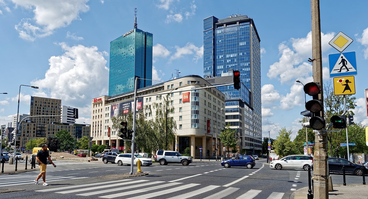 man crossing Pedestrian Crossings at daytime