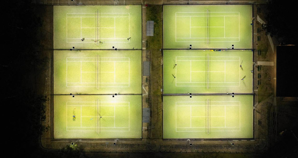 uniform lighting at tennis court at night