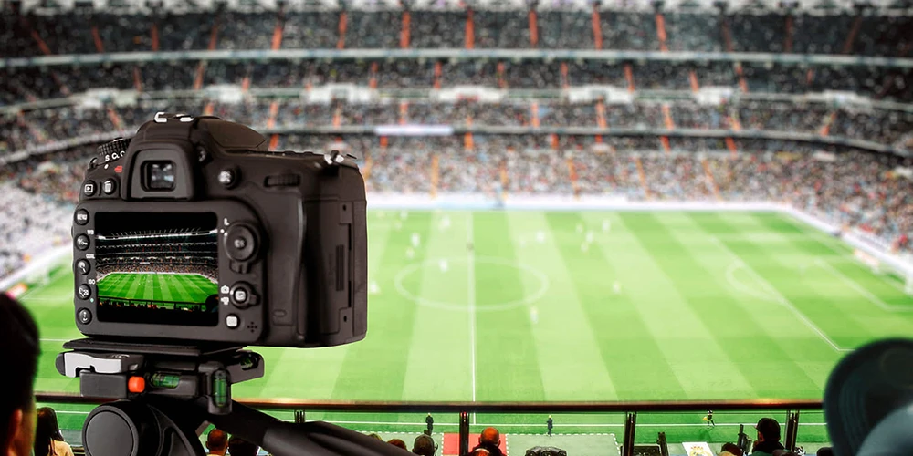 camera tracking the football match