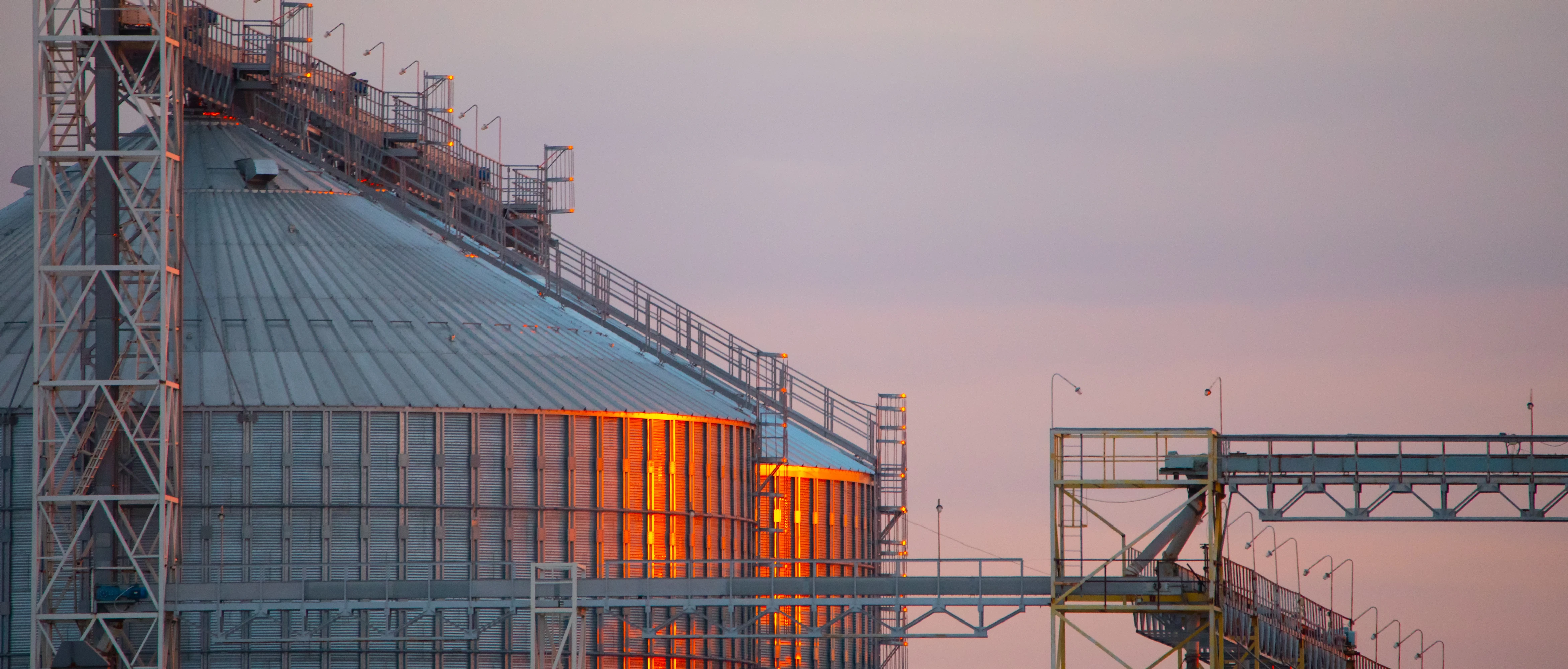 grain storage elevator sunset closeup